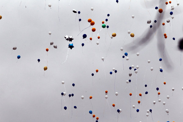 Balloons released into the sky. (Tribune photo) Balloons released into the sky. (Tribune photo)